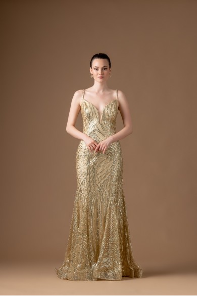 Μακρύ χρυσό φόρεμα γοργονέ Μακρύ χρυσό φόρεμα γοργονέ