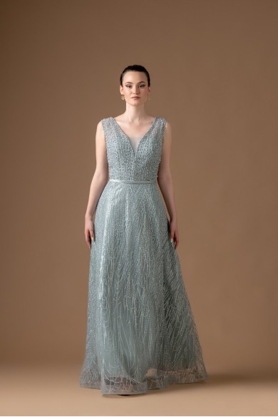 Μακρύ τυρκουαζ φόρεμα κεντημενο με πετρες και στρας Μακρύ τυρκουαζ φόρεμα κεντημενο με πετρες και στρας