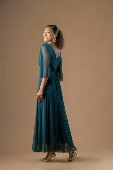 Μακρύ πετρόλ τούλινο φόρεμα με ντεκολτέ , καμπάνα μανίκι και glitter