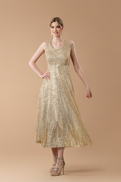 Μακρύ χρυσό φόρεμα με παγιέτες και αέρινη φούστα