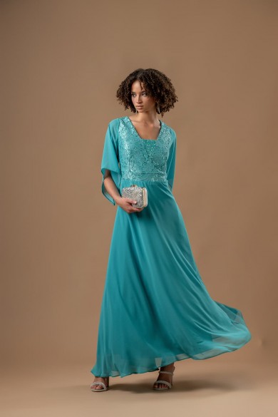 Μακρύ φόρεμα με δαντέλα εξωτερικά και παγιέτες εσωτερικά του μπούστου βεραμάν