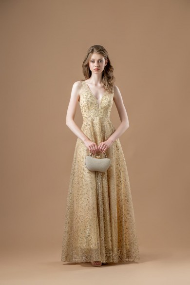 Μακρύ χρυσό φόρεμα με glitter και βαθύ ντεκολτέ Μακρύ χρυσό φόρεμα με glitter και βαθύ ντεκολτέ